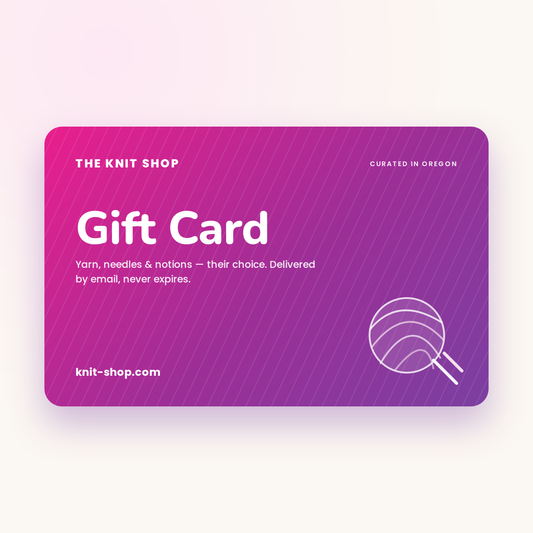 The Knit Shop gift card — pink and purple with a ball of yarn and knitting needles